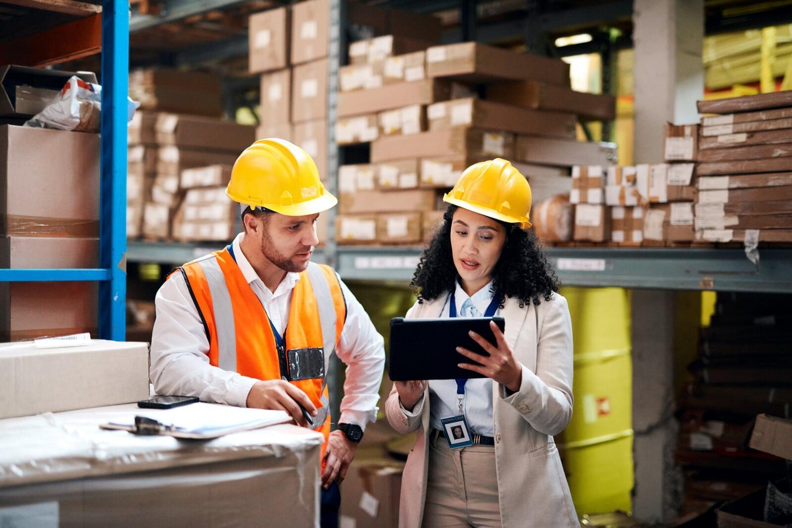 Workers following a business process within a warehouse environment